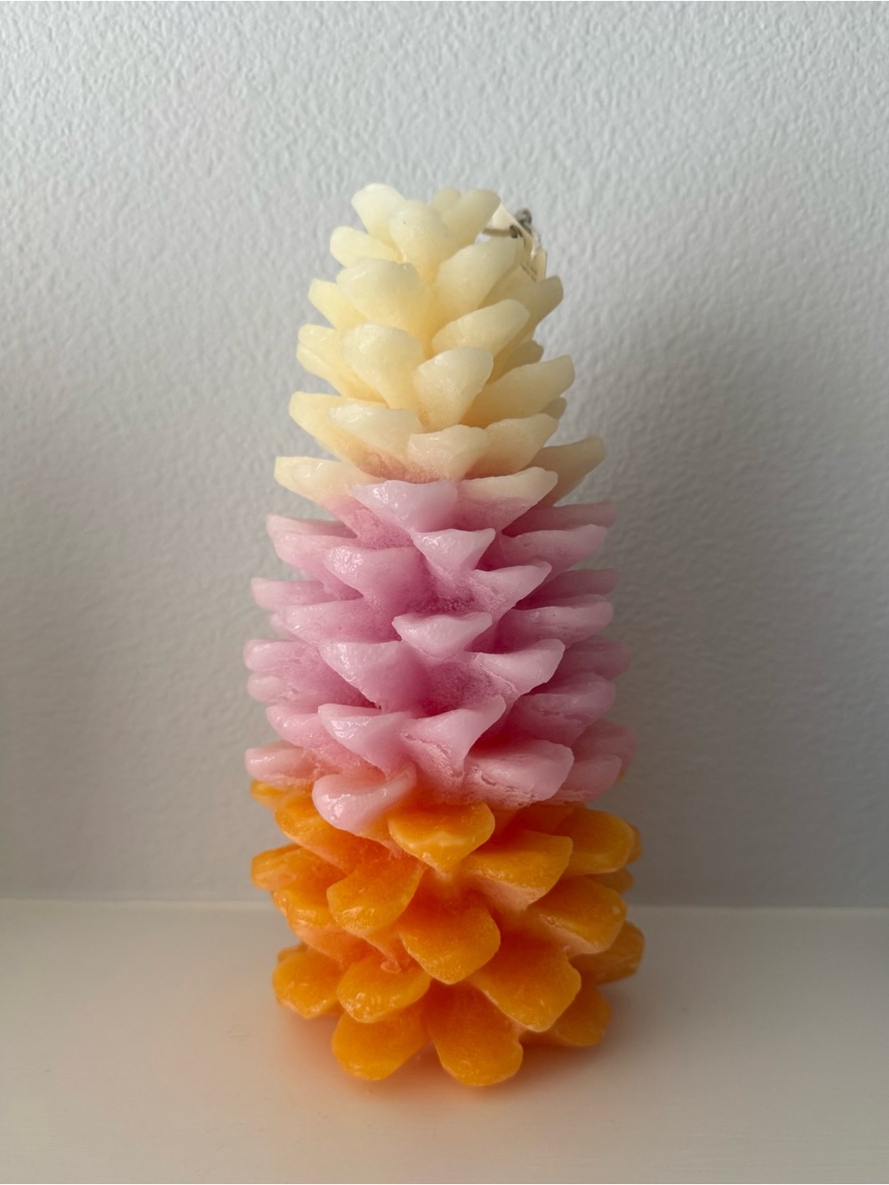 Anthropologie Layered Pinecone Candle in Cream, Pink & Orange
